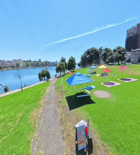 Umbrellas on the lawn at Lake Merritt